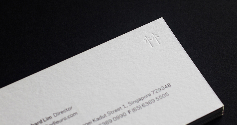 Blind embossed business card for high pressure laminate distributor EDL by graphic design studio Bravo.