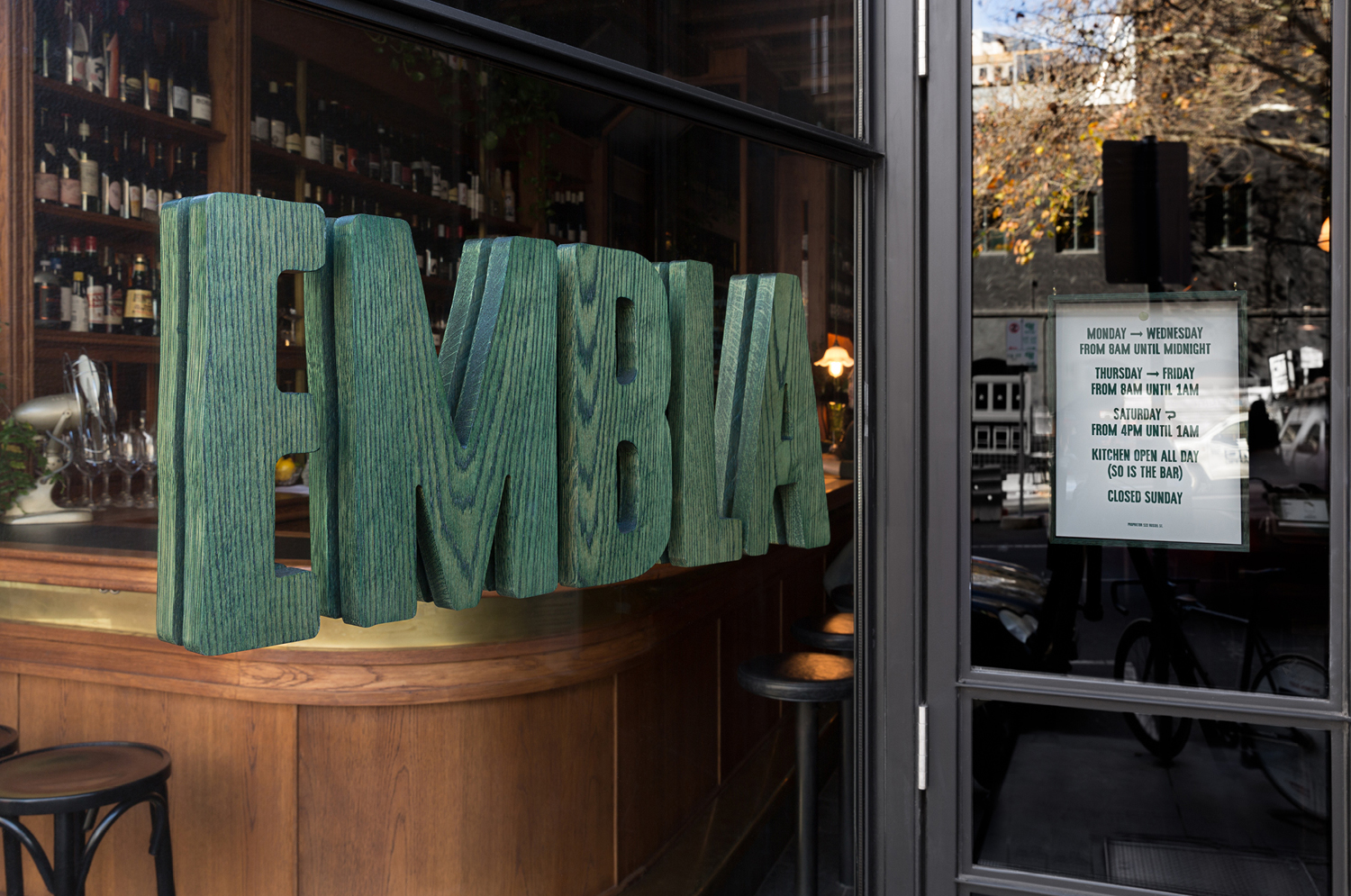 Wordmark and stained timber signage by A Friend Of Mine for Melbourne restaurant and wine bar Embla