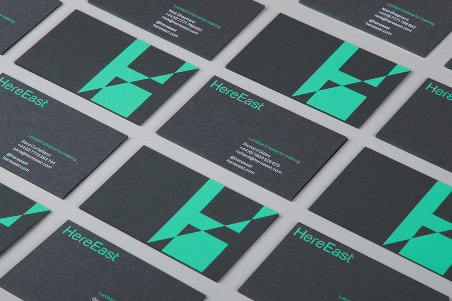 Logo, custom typeface and business cards by dn&co. for commercial space Here East.