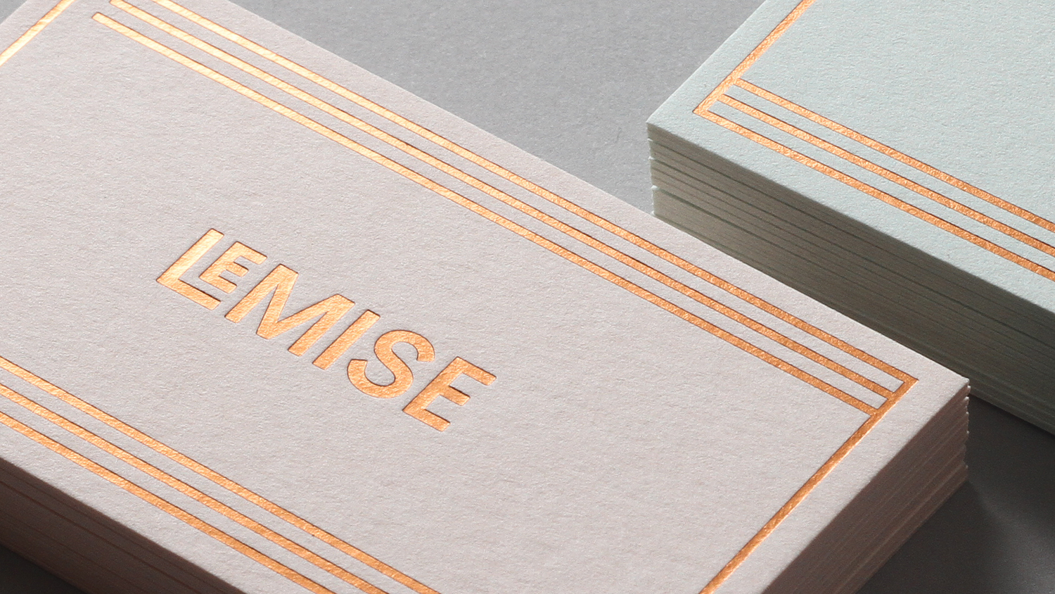 Brand identity and pastel coloured paper and coper block foil business cards for Brooklyn based art and design advisory business LeMise by DIA