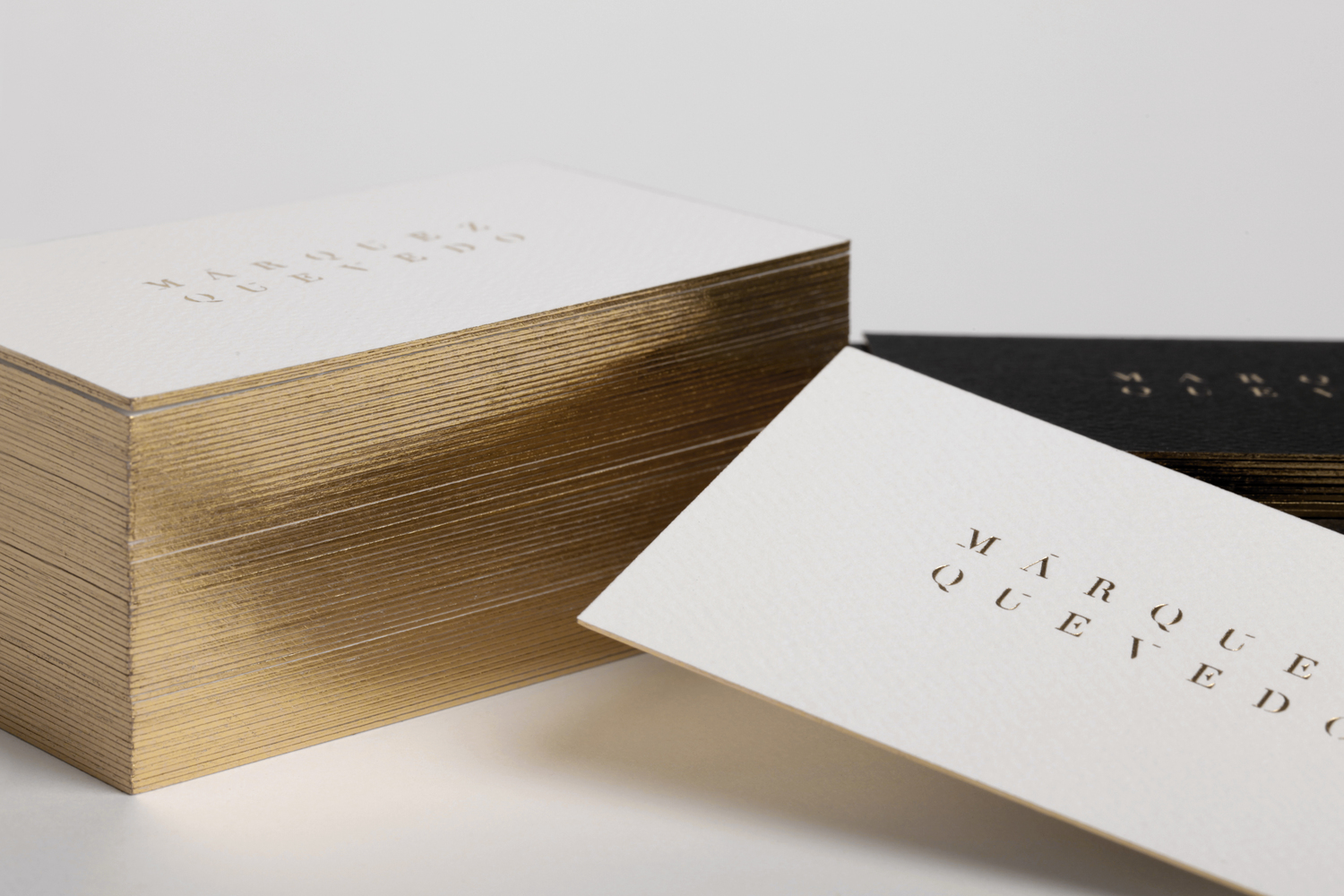 Gold block foiled business cards for architecture studio Marquez Quevedo designed by La Tortillería