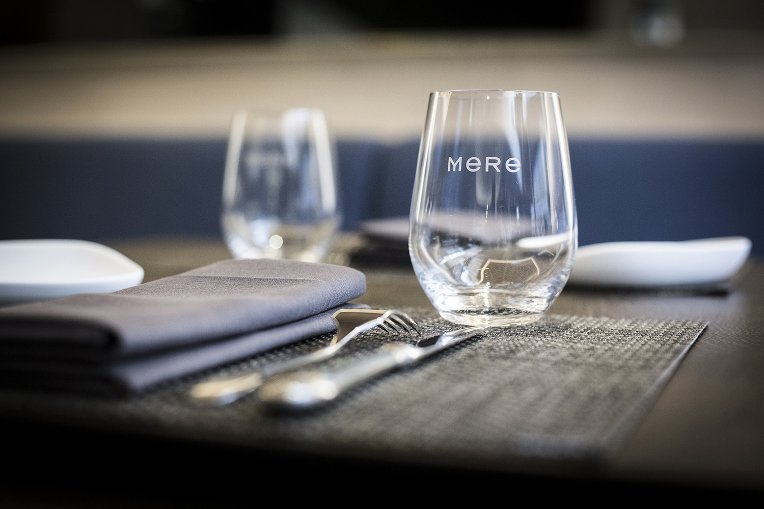 Logotype and branded glassware designed by Bibliothèque for Monica Galetti's new London restaurant Mere