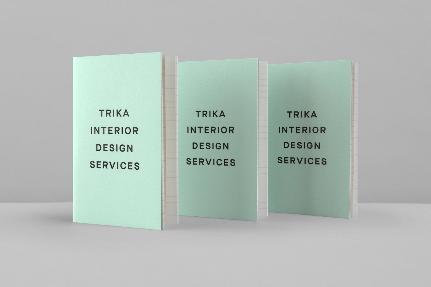 Brand identity and notebooks with a thermographic ink print finish by UK design studio Bunch for Croatian interior design business Trika