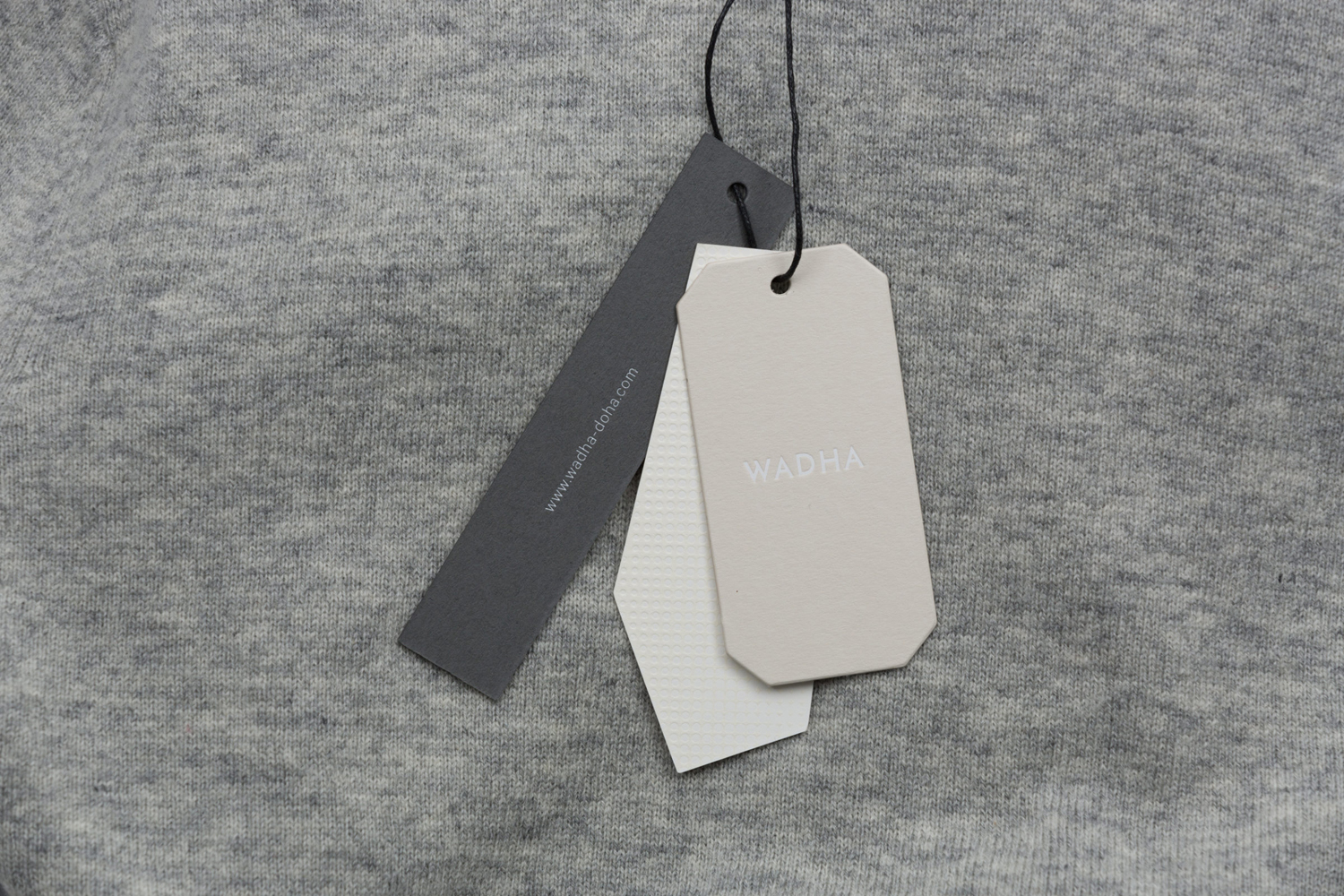 Brand identity and tags for Doha based fashion label Wadha by Two Times Elliott, United Kingdom