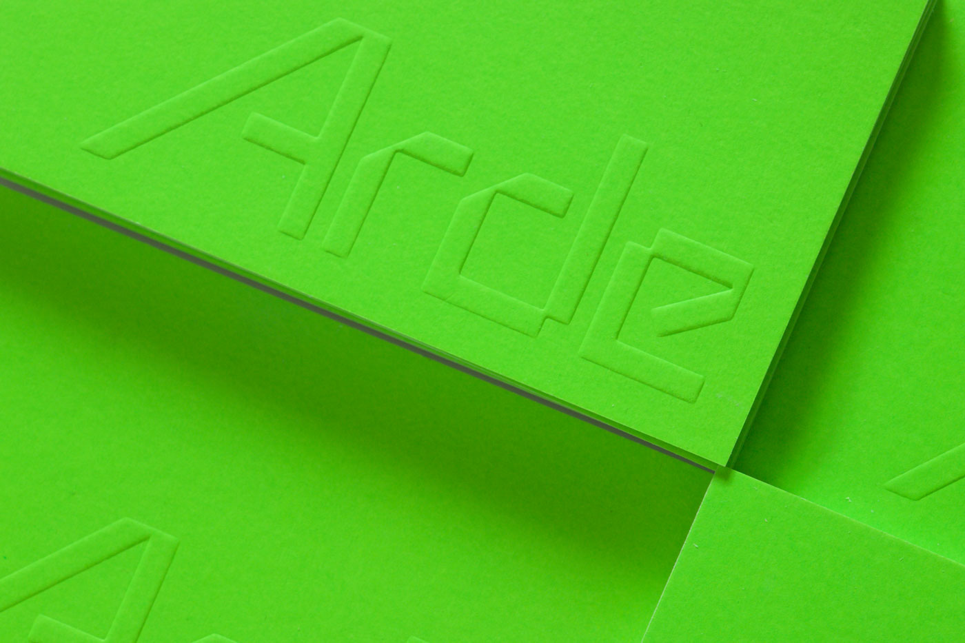 Blind embossed business card and logotype for Lima-based architecture and design firm Arde by IS Creative Studio, Peru