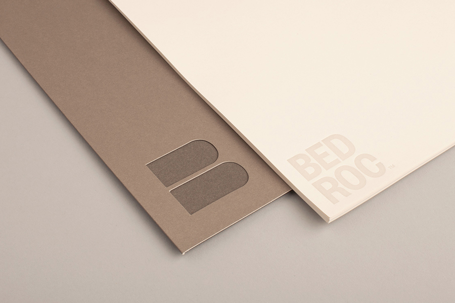 Logo and folder with die cut detail for technological consultancy firm Bed Roc designed by Perky Bros