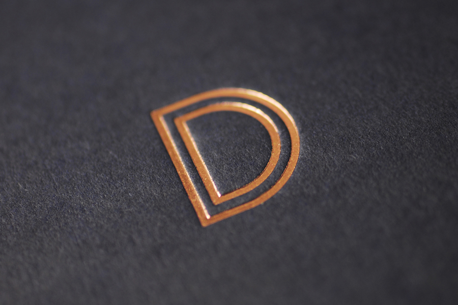 Logotype, business cards with copper foil and edge painted detail and website by Parent for funeral director Devall & Son