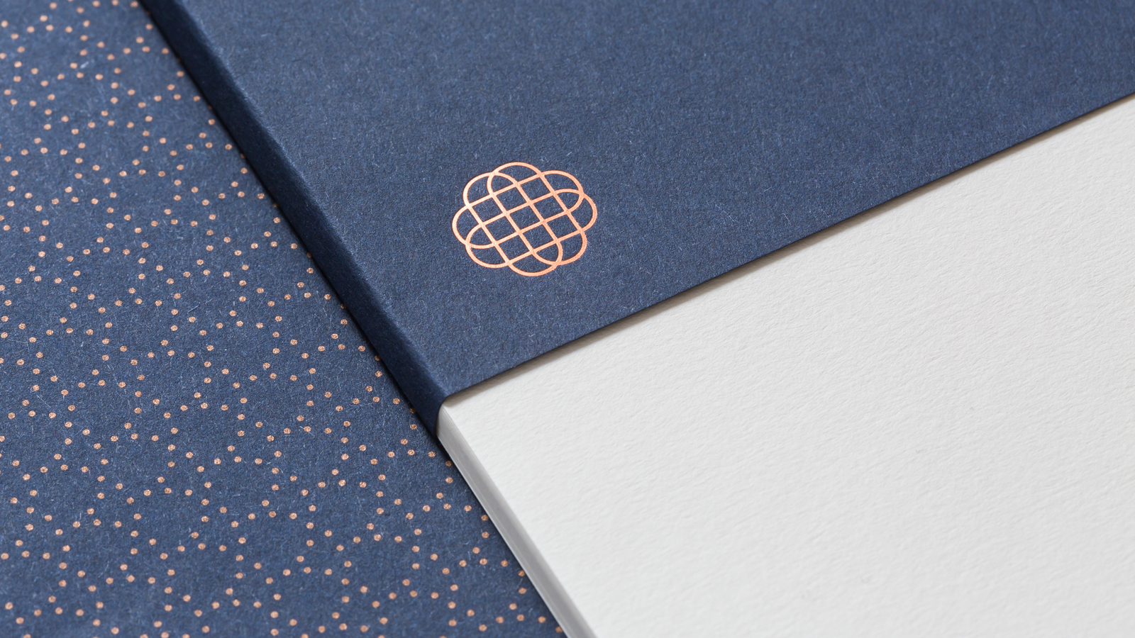Logo and stationery with copper block foil detail for Illinois based Hedeker Wealth & Law by Socio Design