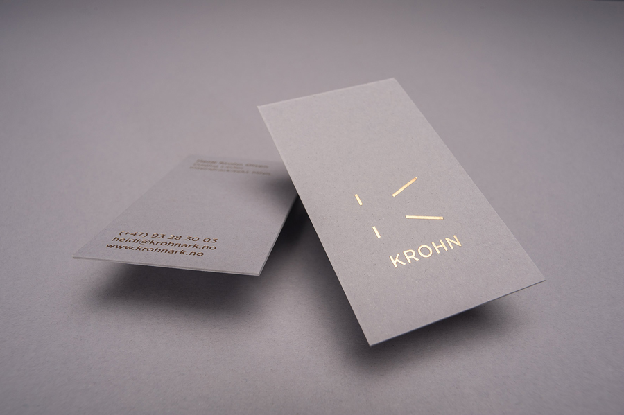Logo and business card with gold foil detail for Oslo-based furniture, interior and architecture studio Krohn designed by Commando Group