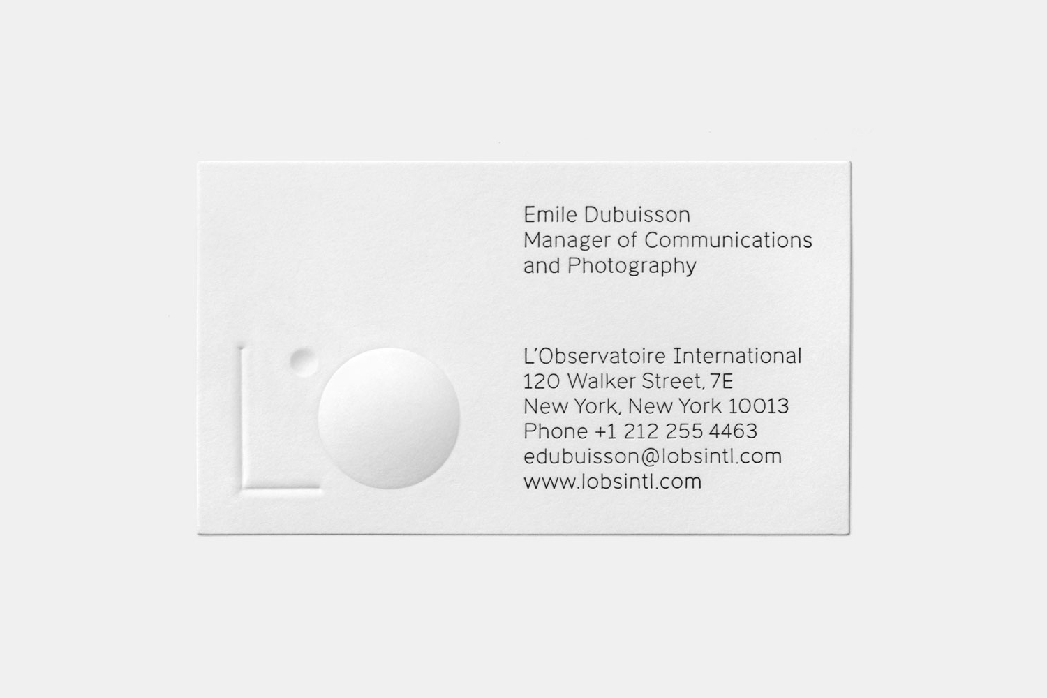 Blind embossed business card for lighting specialists L’Observatoire International by Triboro, United States