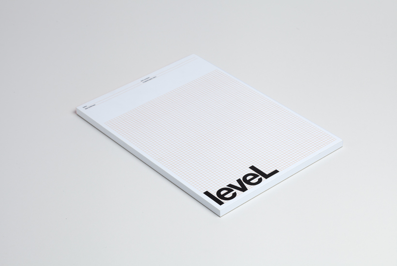 Logotype and grid notepad designed by Studio Hi Ho for Level Improvements