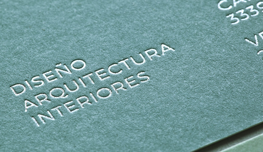 Silver block foiled business card by graphic design studio Atipo for Spanish architecture and interior design firm Mamen Diego. 