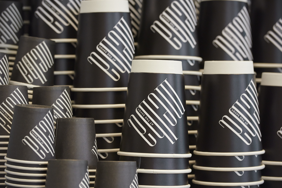 Branded coffee cup designed by Pentagram for London patisserie and cafe Melba at The Savoy