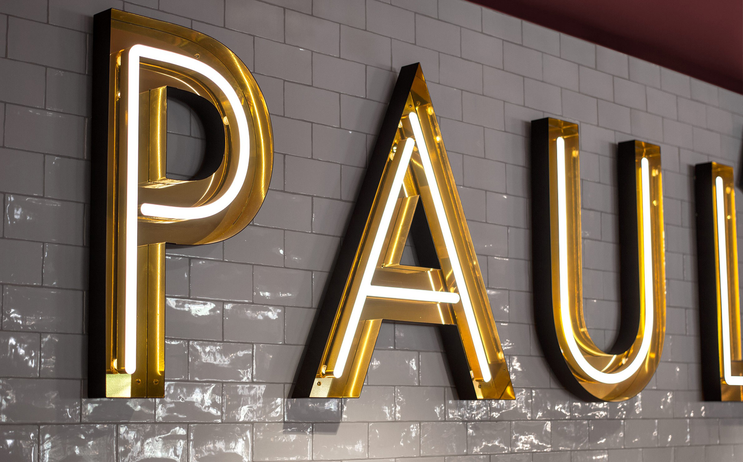 Neon signage for Stockholm-based restaurant Paul's at Haymarket by 25AH, Sweden