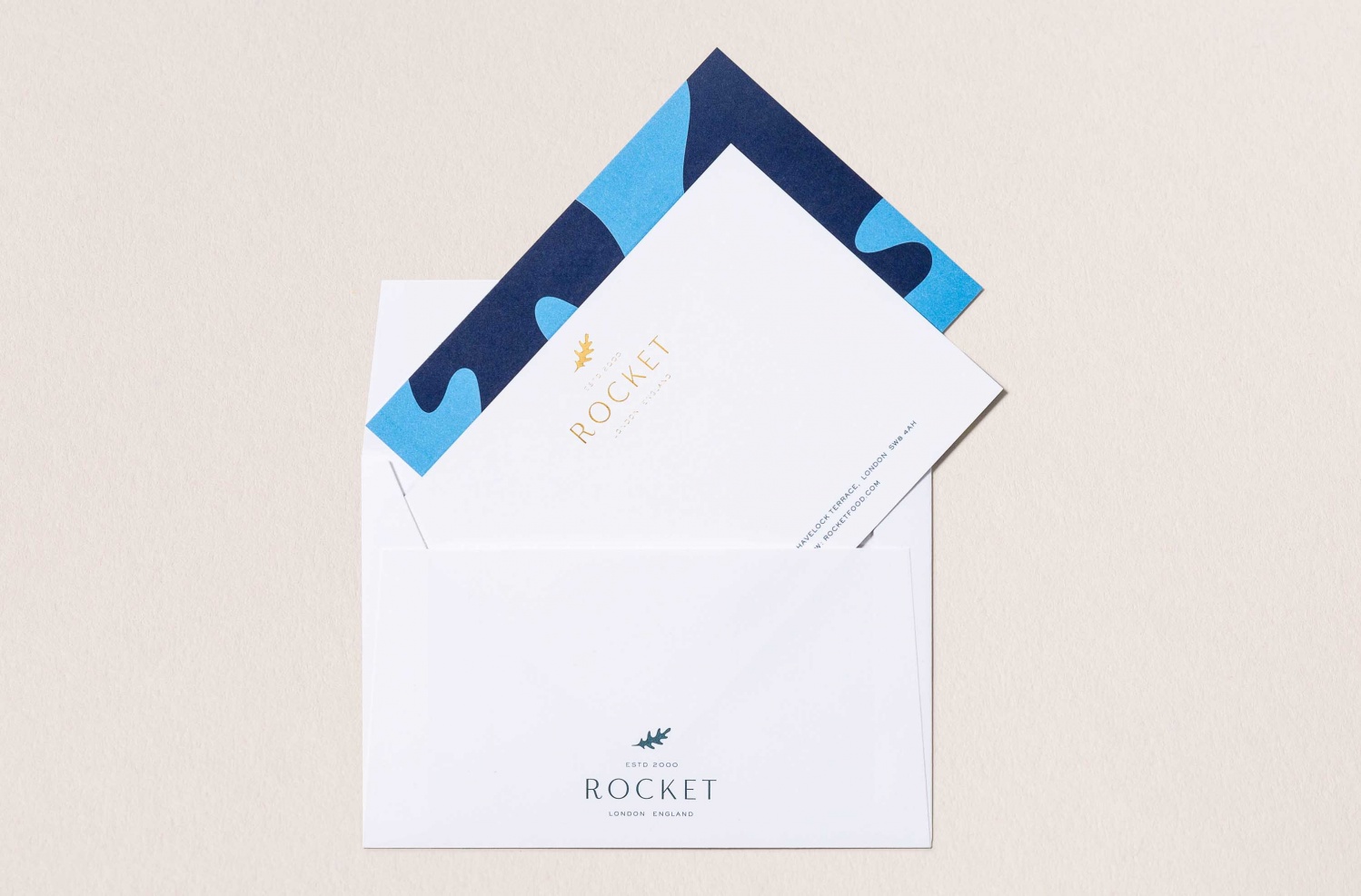 Logo, pattern, stationery and van livery by London-based studio Here Design for UK catering business Rocket