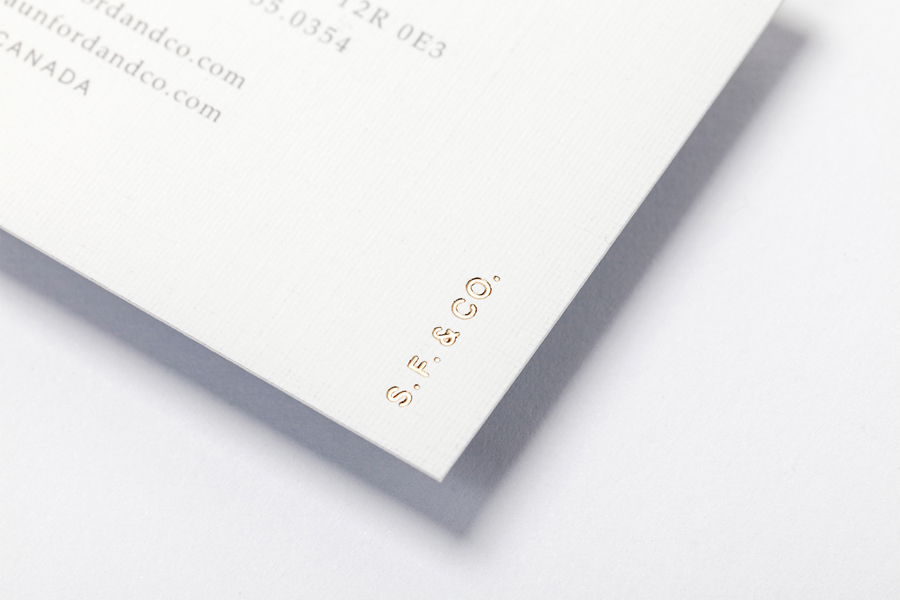 Logotype and business card with block foil detail designed by Savvy for bespoke furniture design firm Shaun Ford & Co. 