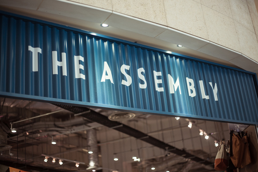 Logo and neon sign by Bravo for Singapore based men's retail store and coffee shop The Assembly