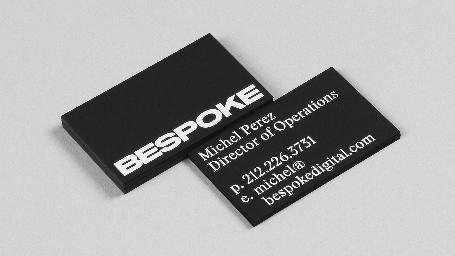 Brand identity, custom typeface and business cards by New York based DIA for boutique retouching business Bespoke