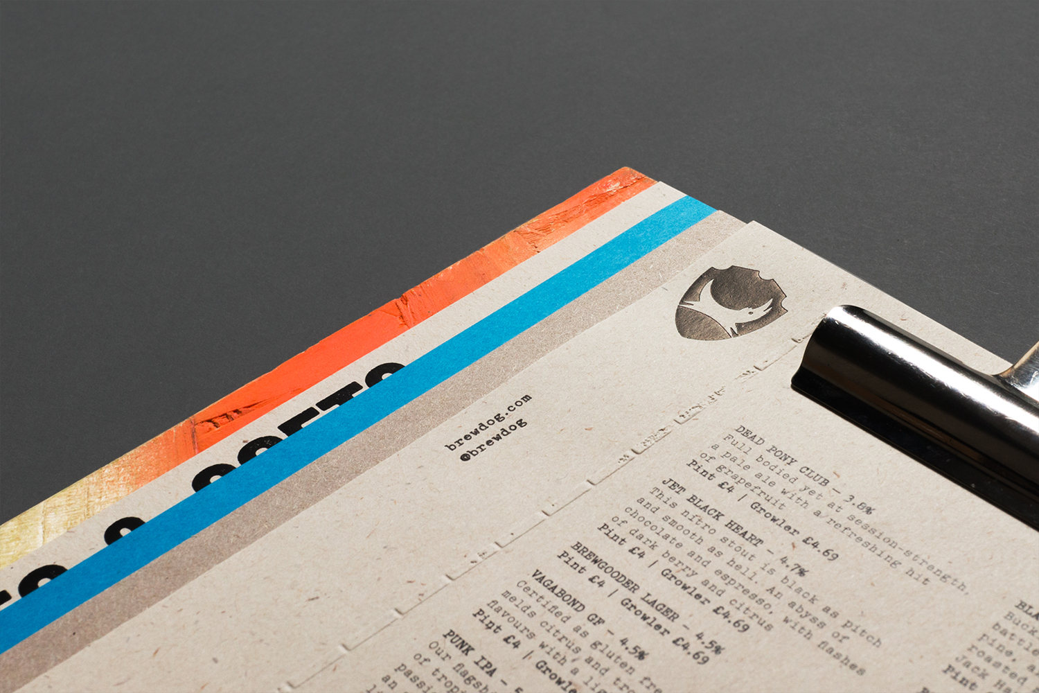 Menus that feature mixed fibre, dyed and uncoated papers, blind embossing and block foil for Brewdog designed by O Street