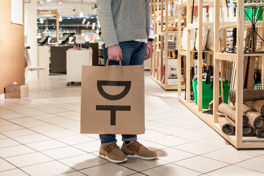 Logo and unbleached carrier bag by Kurppa Hosk for Swedish contemporary furniture, art and design curator and retailer Designtorget