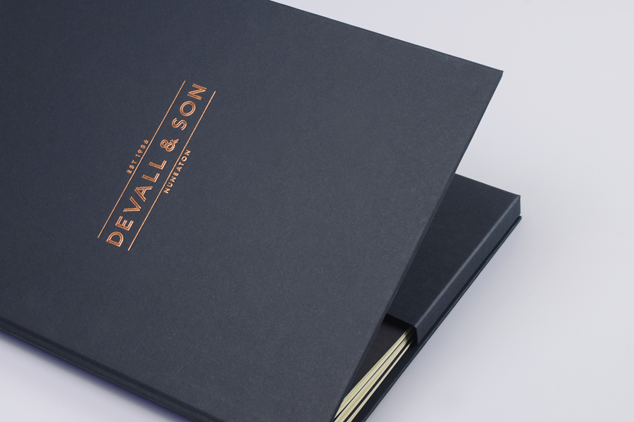 Logotype, business cards with copper foil and edge painted detail and website by Parent for funeral director Devall & Son