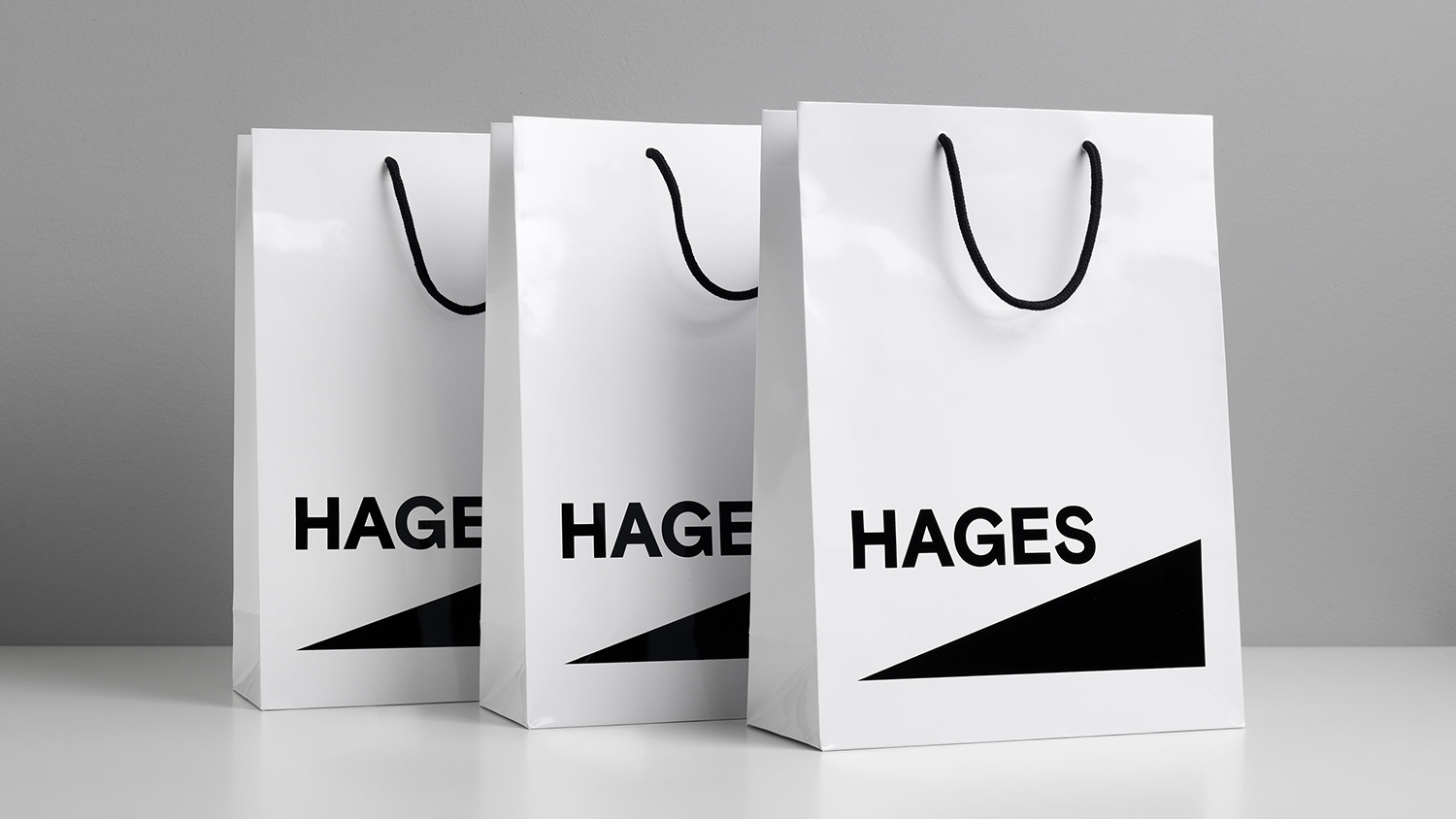 Logo, stationery, bags, signage and t-shirts by The Studio for Stockholm-based independent electronics retailer Hages