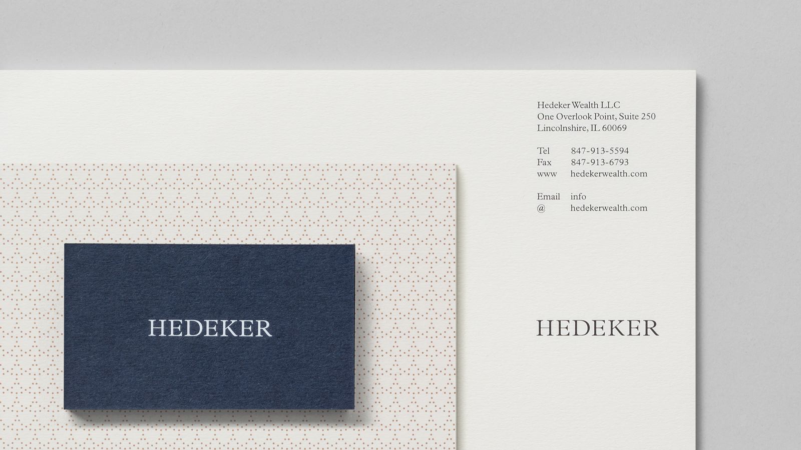 Logo, letterhead and business cards for Illinois based Hedeker Wealth & Law by Socio Design