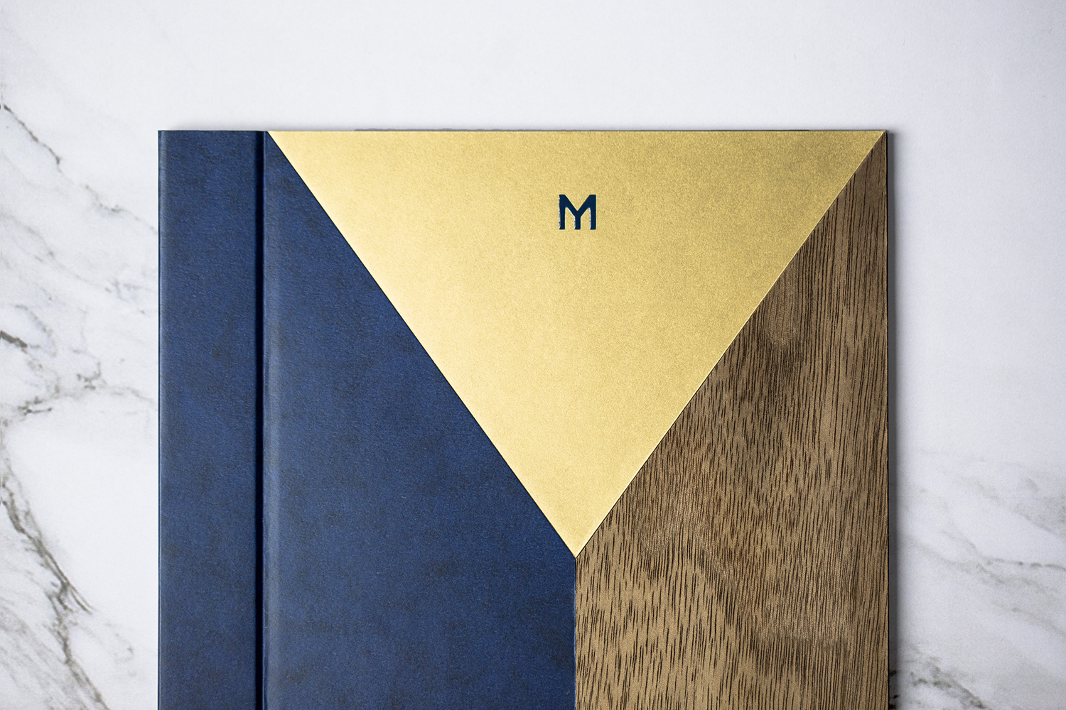 Brand identity and inlaid menu covers designed by Bibliothèque for Monica Galetti's new London restaurant Mere