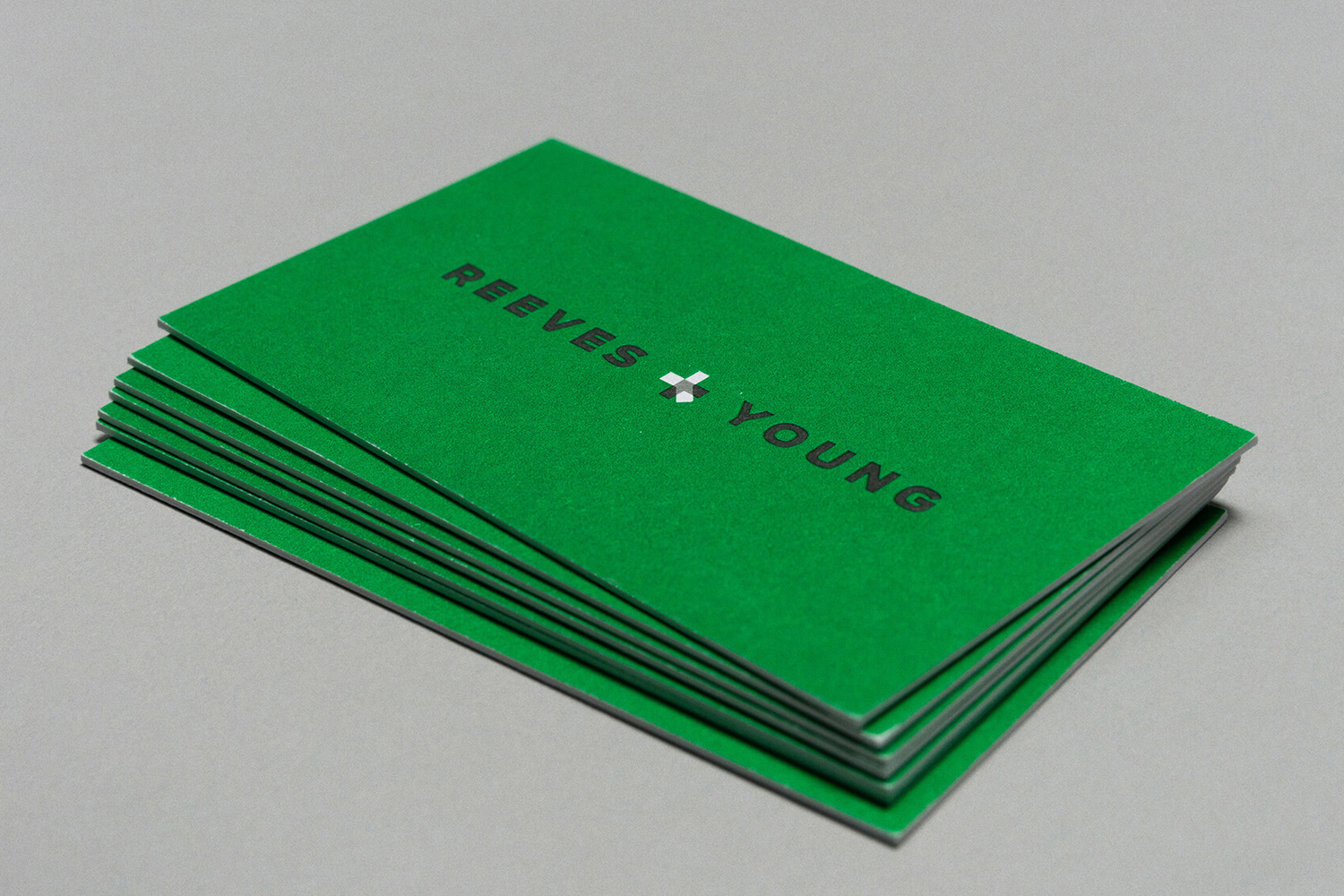 Bright spot green business cards for Reeves & Young designed by Matchstic