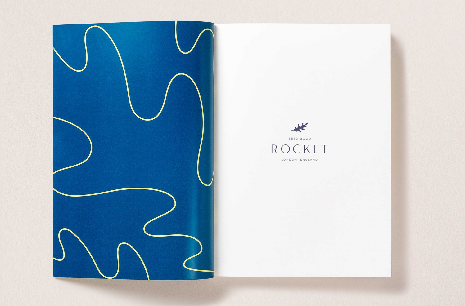 Logo, pattern, stationery and van livery by London-based studio Here Design for UK catering business Rocket