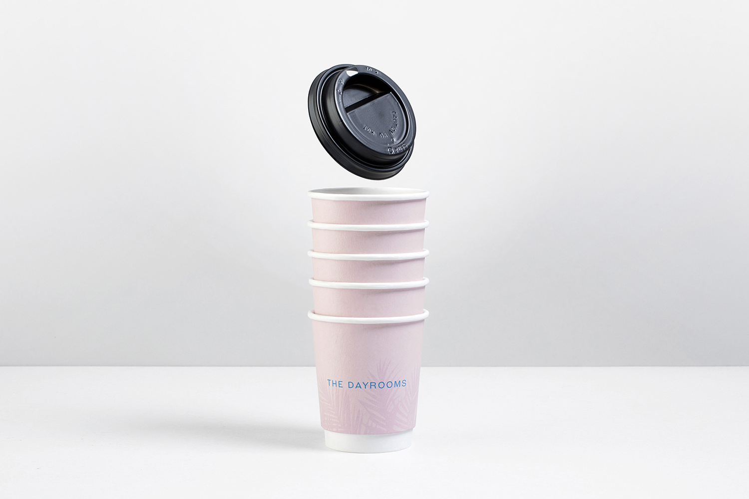 Branded coffee cups for The Dayrooms Cafe designed by Two Times Elliott