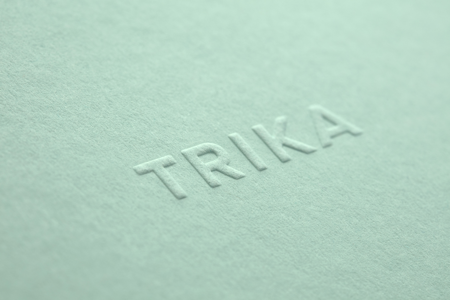 Logotype as a blind emboss by UK design studio Bunch for Croatian interior design business Trika