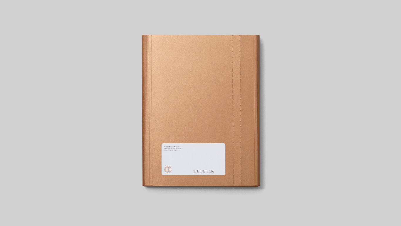 Logo and folder with metallic copper paper detail for Illinois based Hedeker Wealth & Law by Socio Design