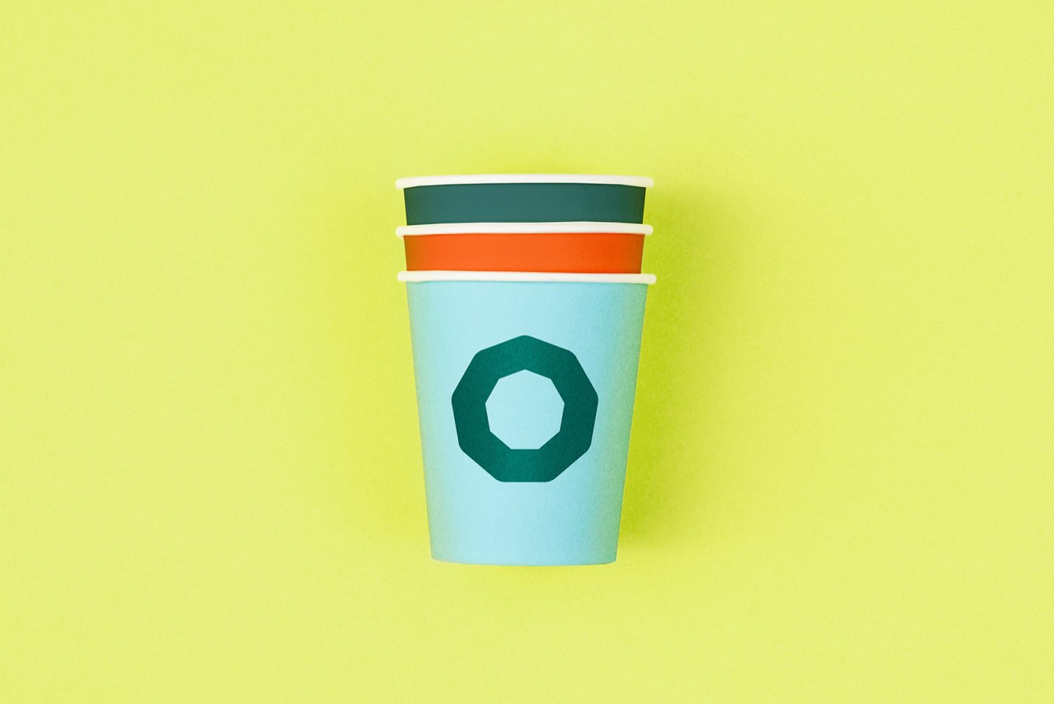 Logo and branded coffee cups designed by Werklig for professional banking tool Holvi