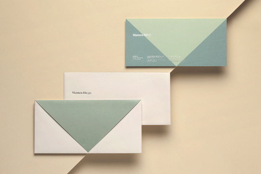 Silver block foiled envelope and compliment slip by graphic design studio Atipo for Spanish architecture and interior design firm Mamen Diego. 