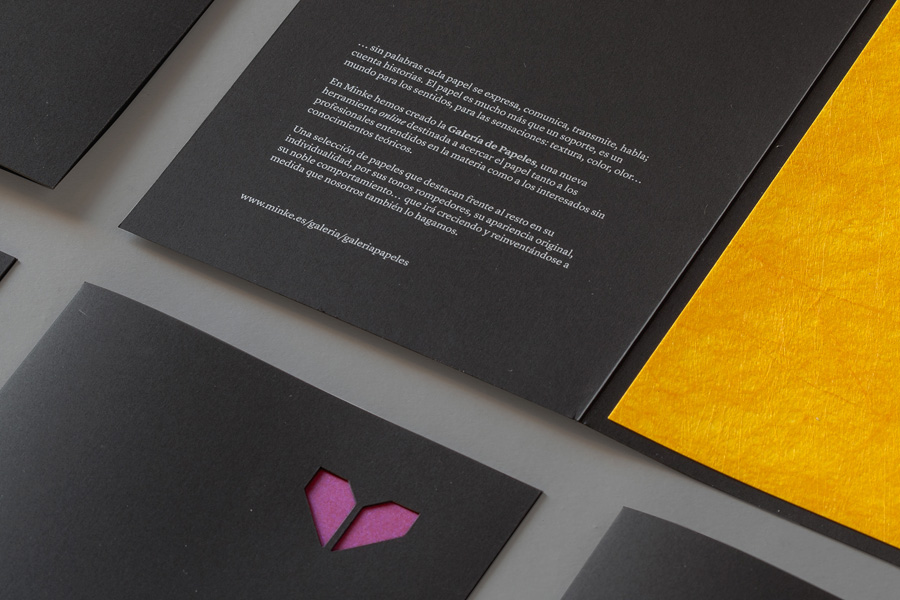 Minke paper sample folders with die cut window, black paper and white ink detail designed by Atipo