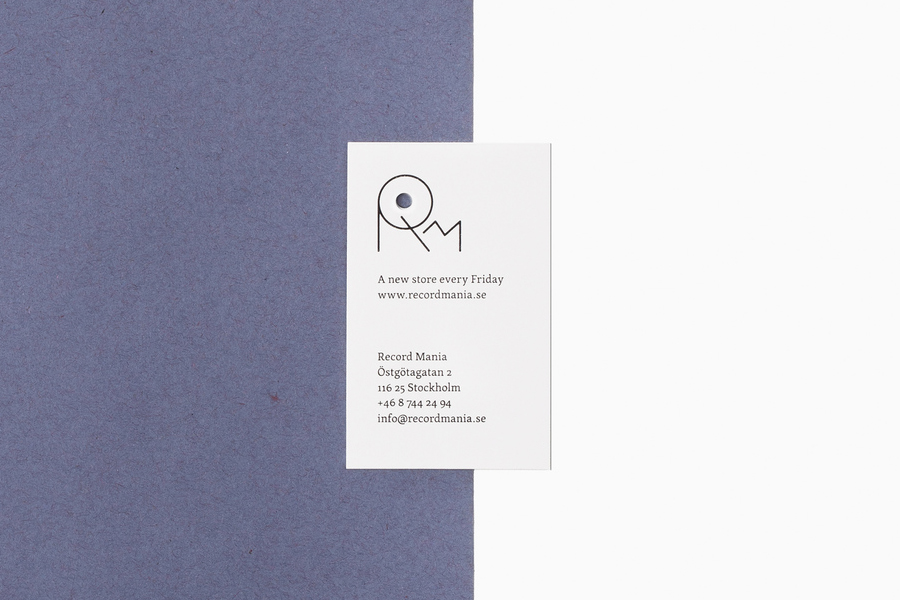 Hole punched business card for Record Mania by Bedow