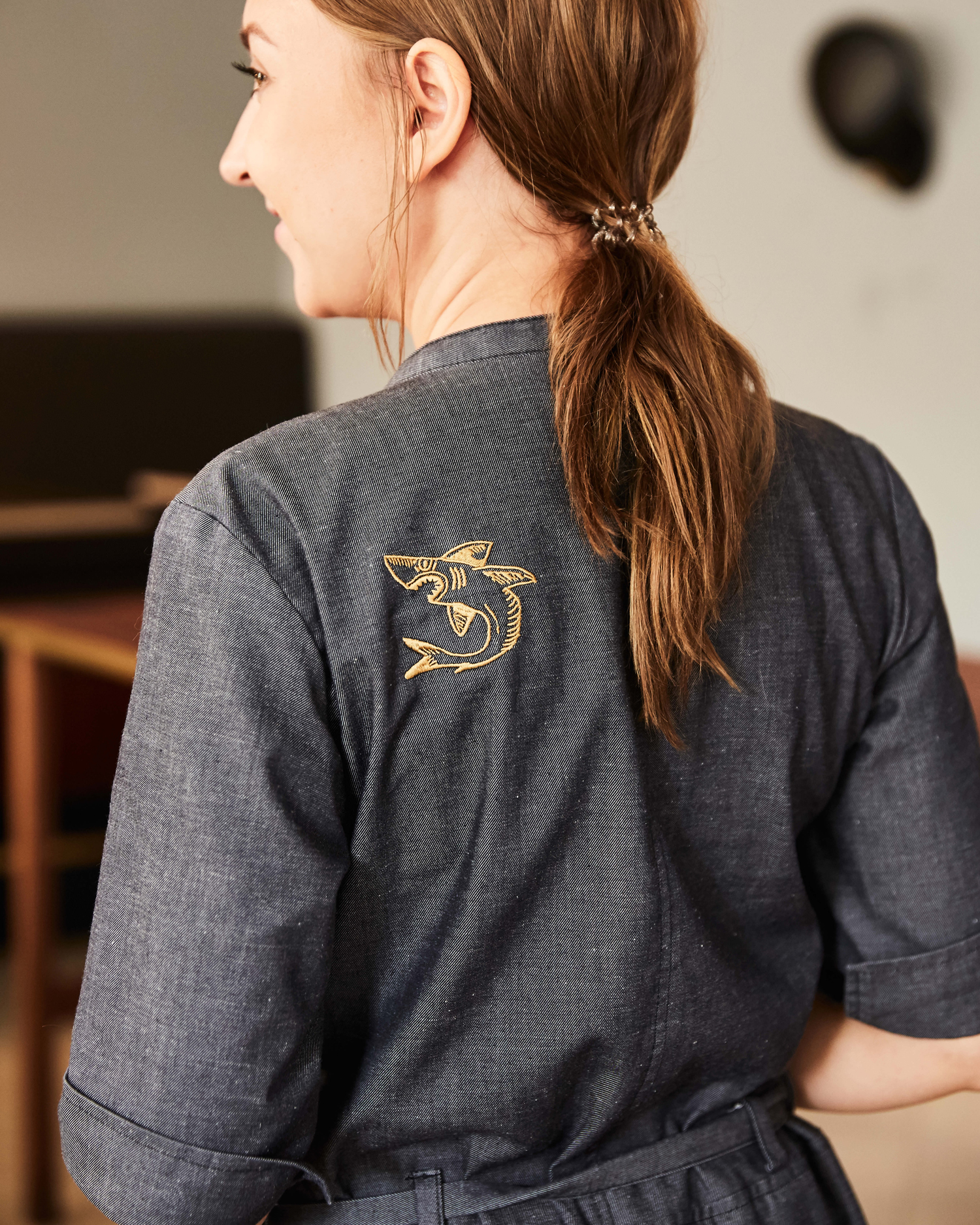 Branding and embroidered uniform by Bond for Helsinki bar and restaurant Roster