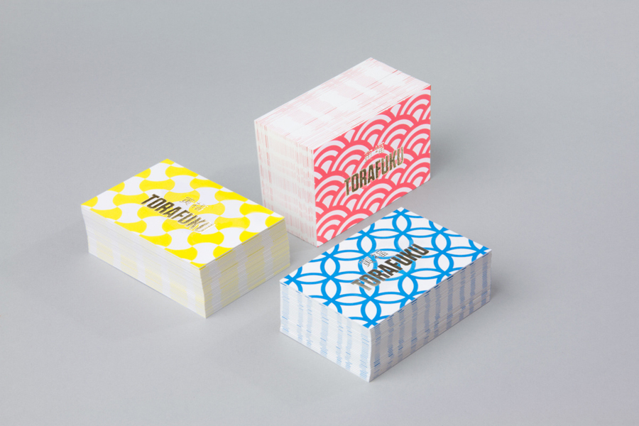 Gold foiled business cards for modern pan Asian restaurant Torafuku designed by Brief