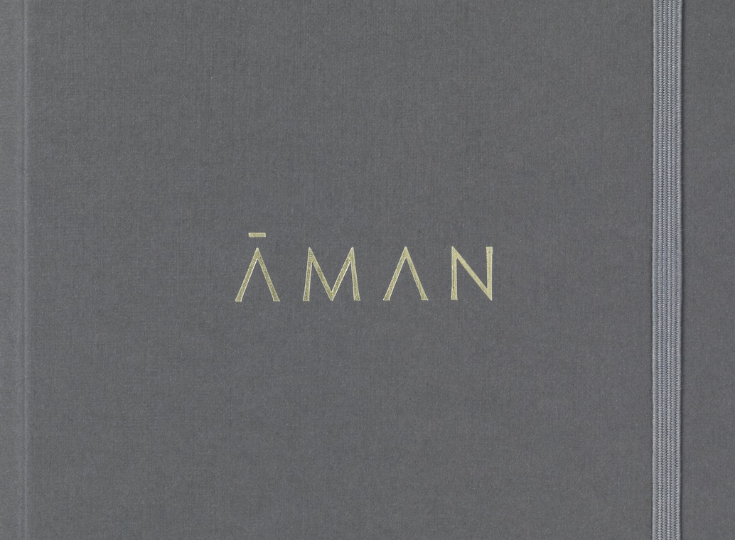 Brand identity and notepad cover for luxury resort business Aman by Construct, United Kingdom