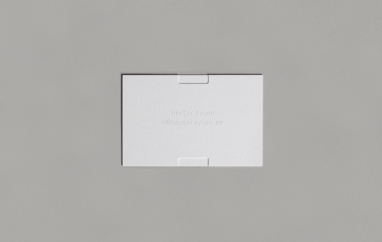 Brand identity and blind embossed business cards for Héctor Ayuso by graphic design studio Mucho