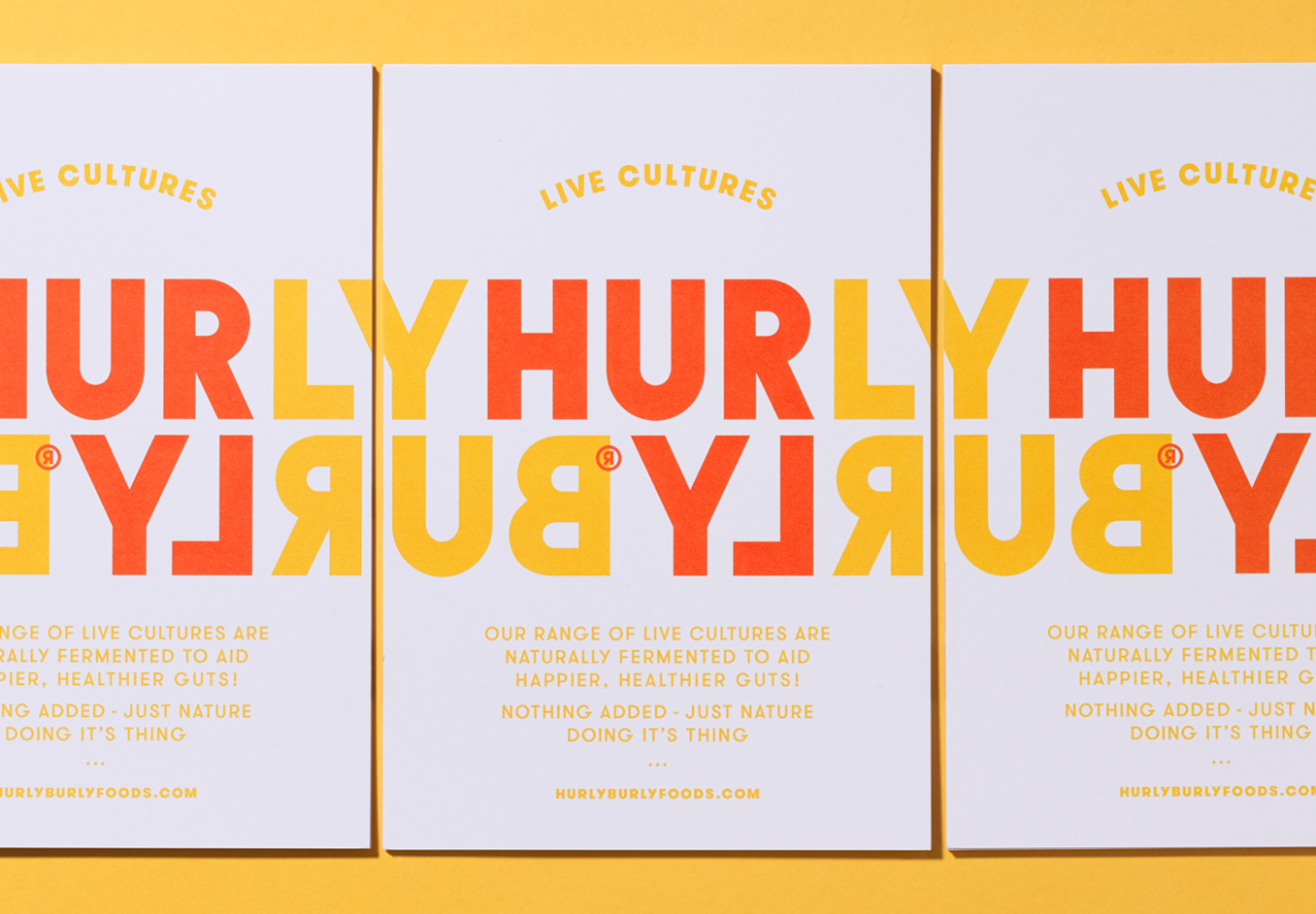 Logotype, packaging and print by London-based Midday Studio for Hurly Burly's latest range of raw slaw