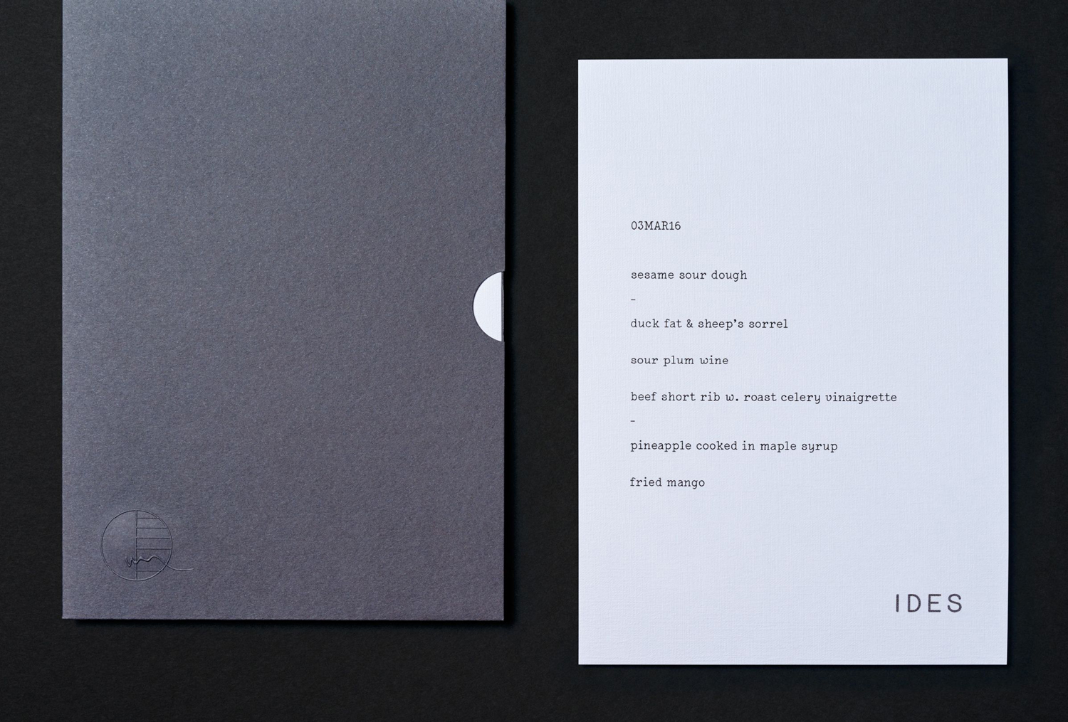 Menu with blind embossed sleeve by graphic design studio Swear Words for Melbourne restaurant Ides