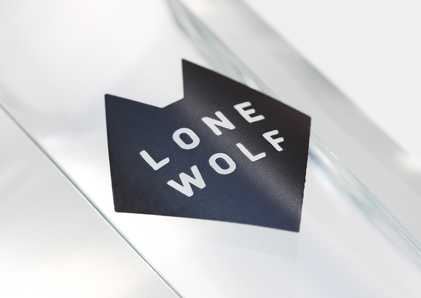 Logo and packaging design by London-based B&B Studio for Brewdog's craft spirits range Lone Wolf