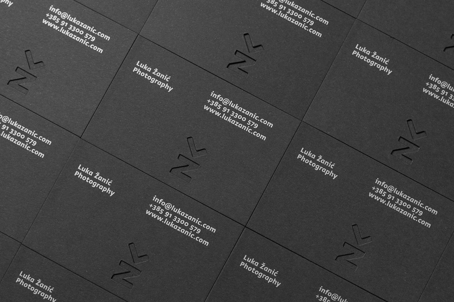 Business cards with die cut and silver spot colour detail by Studio8585 for architectural photographer Luka Žanić
