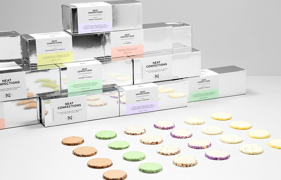 Logo, business cards and mirrored card packaging designed by Anagrama for Mexican brand Neat Confections