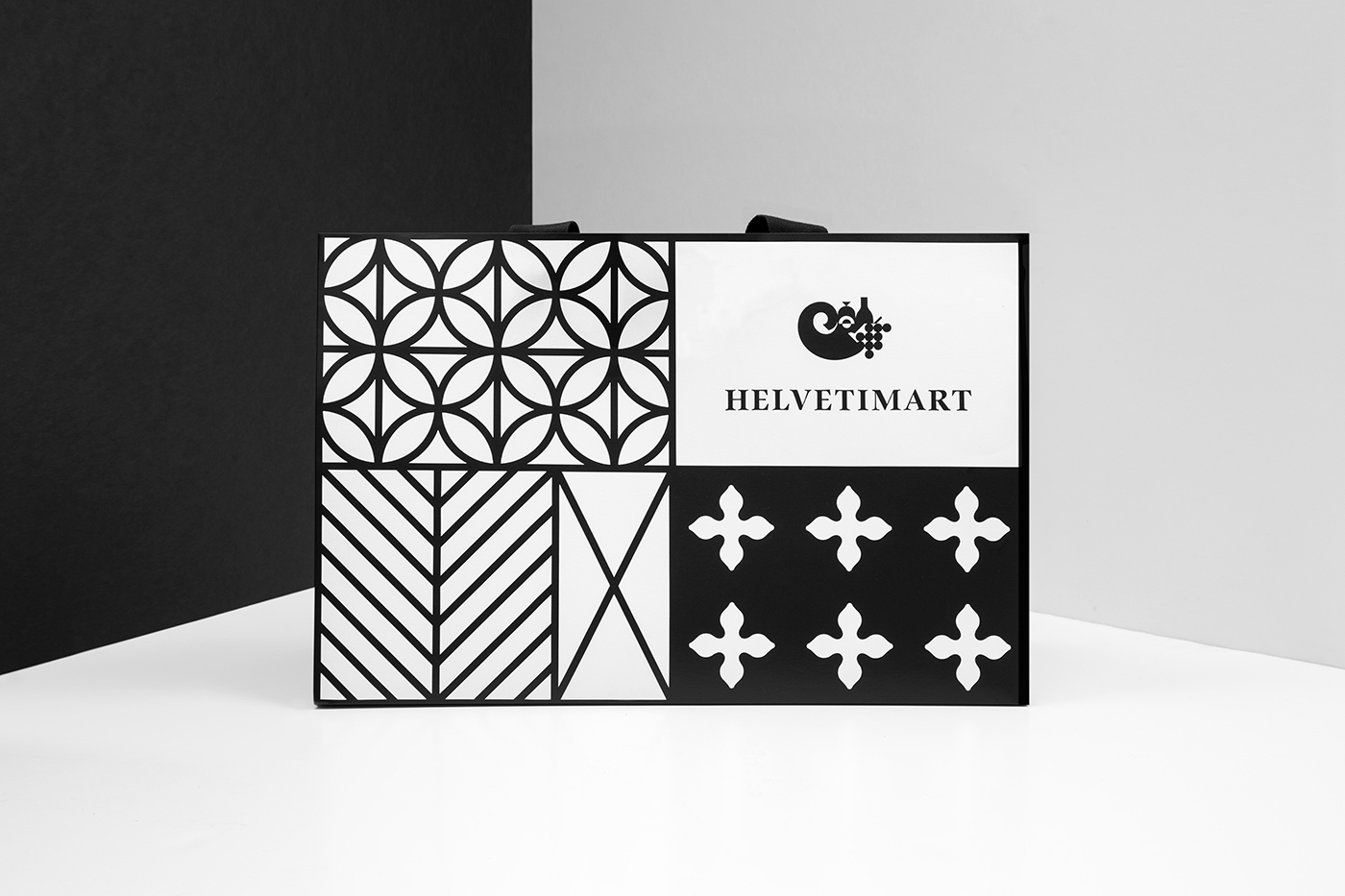 Brand identity, logo and shopping bag by Anagrama for Lausanne-based independent food and speciality supermarket Helvetimart