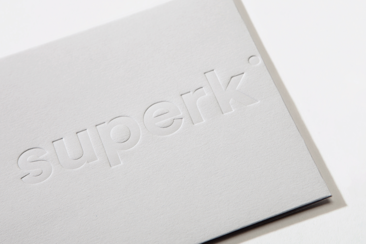 Brand identity and blind embossed envelope by Toronto-based graphic design studio Blok for Canadian architecture firm Superkül