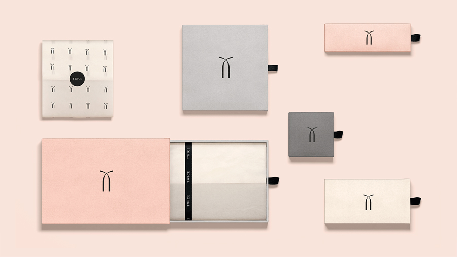 Visual identity and packaging for Chinese luxury accessory brand Twice by London based graphic design studio Socio Design