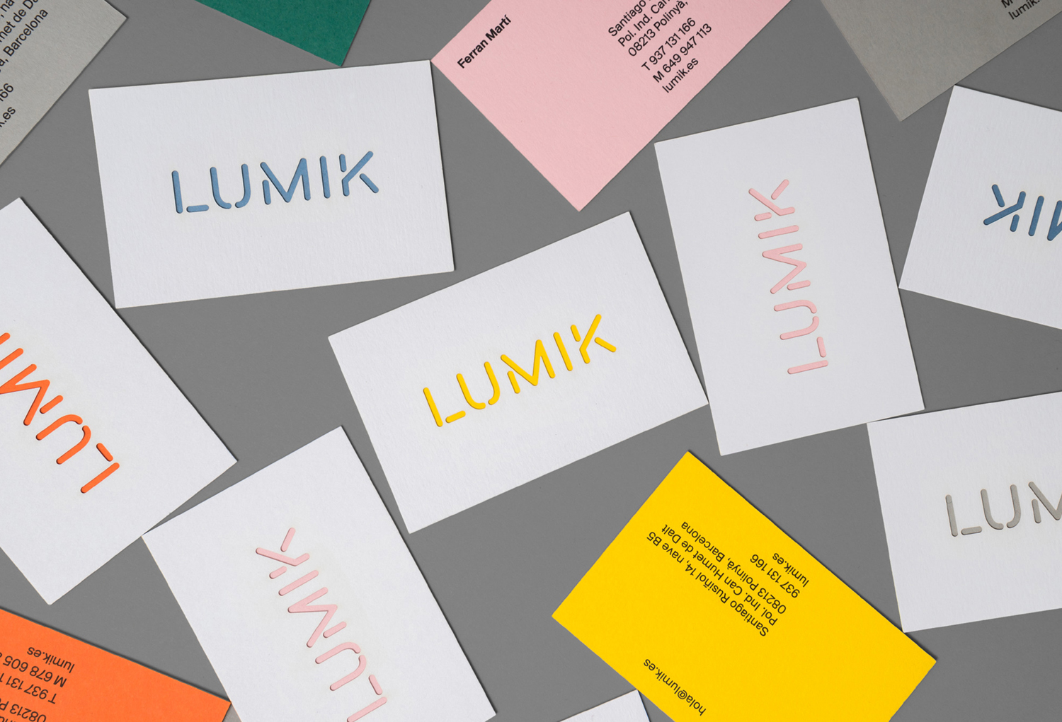 Logotype and duplex business cards design by Hey for Spanish lighting design and manufacturing company Lumik